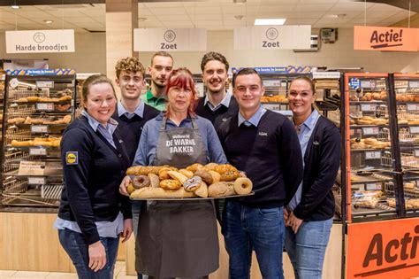Infografiek van de nieuwe Lidl-formule met Vers & Ambachtelijk-meubel en Scan & Go