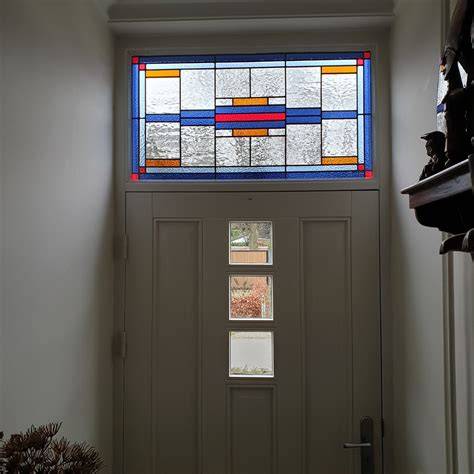 Voorbeeld van glas-in-lood details passend bij jaren 60 voordeuren
