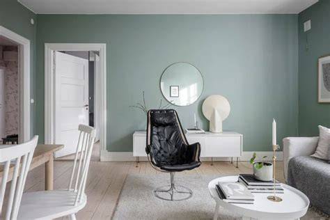 Mintgroene muur als centrum van de slaapkamer (inspiratiebeeld)