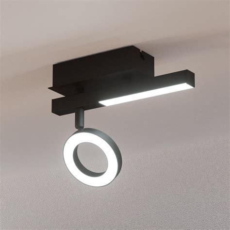 Illustratie van een ultraplatte zwarte LED plafondspot, nadruk op het dunne profiel.