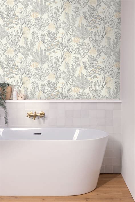 Geel behang met speels tegelpatroon, zachte blonde tinten