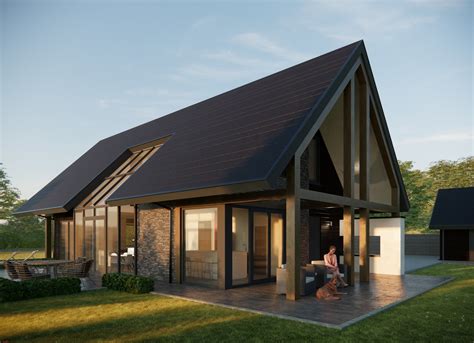 Foto van een moderne schuurwoning met een onderkeldering en daglichtinval.