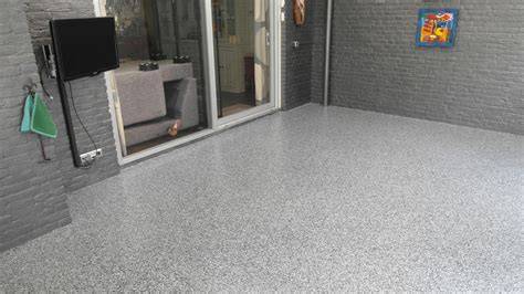 Foto: Voorbeelden van gietvloeren in garages: epoxy, troffel en beton cire
