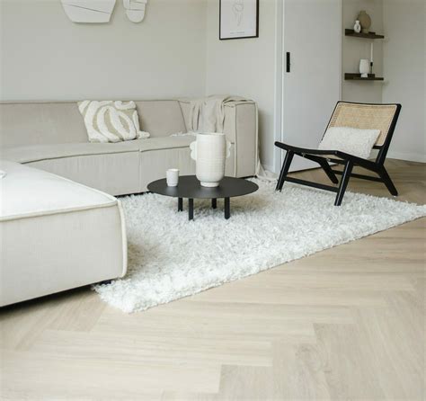 Voorbeelden van laminaatdecors: grijs, wit en visgraat