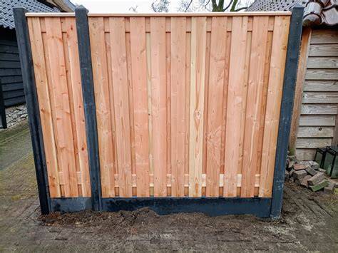 Diagram van afdekkappen op een houten schutting