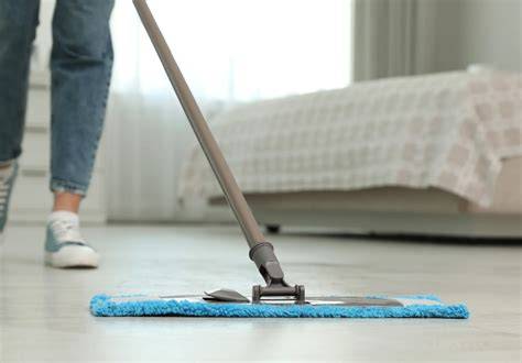 Foto: stappenplan houten vloer dweilen