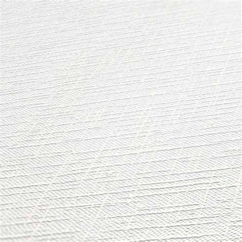 Close-up van het vliesbehang met structuur dat gebruikt wordt voor de muurdecoraties