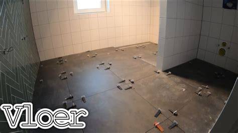 Stappenplan voor het betegelen van een badkamer (wand en vloer)