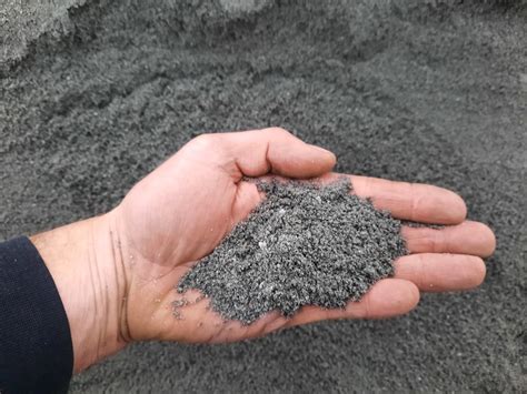 Schematische afbeelding van zandbed, brekerzand en inveegzand lagen