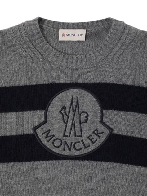 Infographic over Moncler logo en kenmerkende details