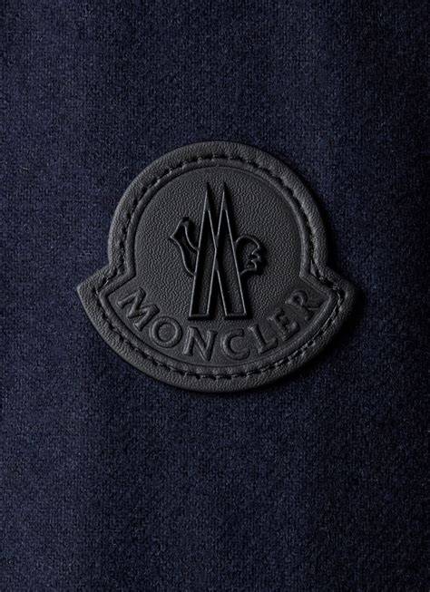 Infographic: duurzaamheidsetiquette van Moncler