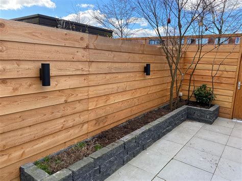 Voorbeeld van een schutting gemaakt met Vuren Zweeds Rabat.