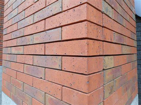 Schematische weergave: stap-voor-stap metselwerk met dunbedmortel en verfdifferentiatie