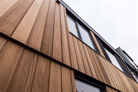 Illustratie van verschillende legpatronen voor houten gevelbekleding: verticaal, horizontaal, visgraat en Zweeds rabat.