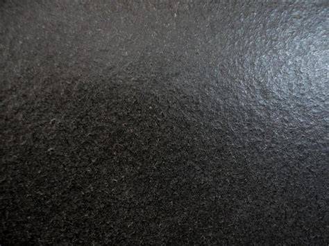 Afbeelding: Absolute Black Leather Finish in verschillende afwerkingen en formaten