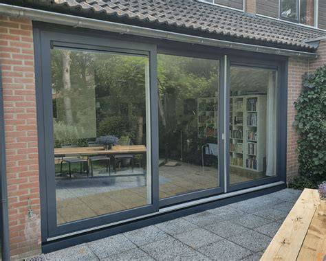 Foto: Uitgevoerd project met kunststof kozijnen en schuifpui bij een woning