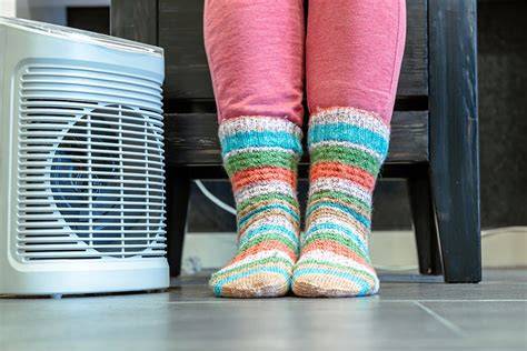 tapijt op houten vloer tegen koude voeten