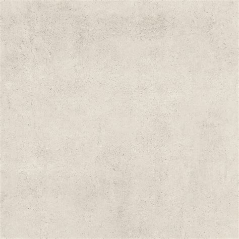 Detail van een betonlook tegel met een subtiel genuanceerd patroon