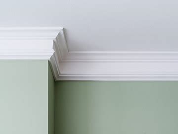 Detail van de bevestiging van grenen decorlijsten voor de pootconstructie van de salontafel