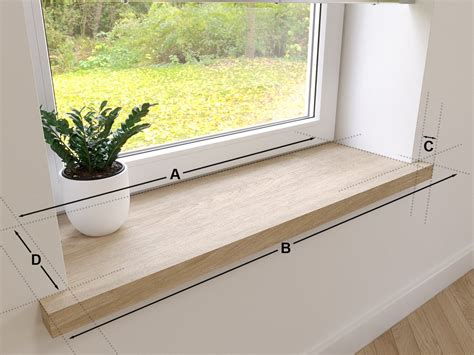 Detailfoto van een hoekafwerking van een vensterbank bekleed met laminaat.