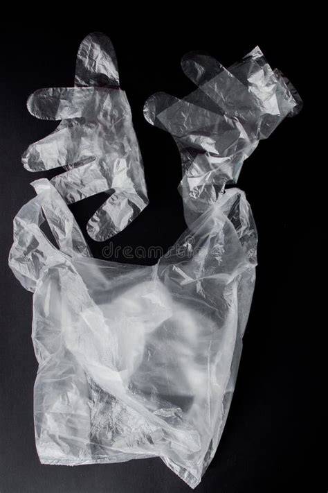 handschoenen en plastic zak voor grof glas