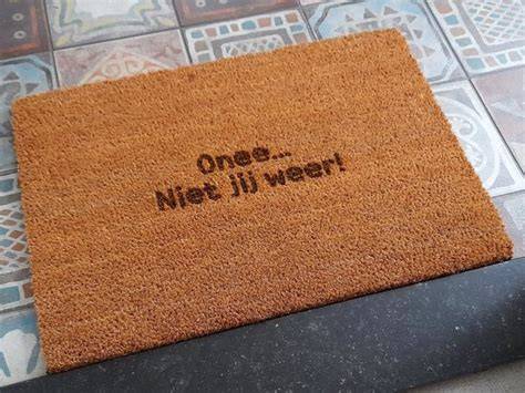 Decoratieve deurmat en pootafwerking