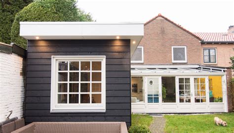 Infographic: Voor- en nadelen van houten vs. stenen aanbouw