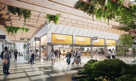 Artistieke impressie van de energieneutrale Jumbo Groningen Paddepoel met zonnepanelen op het dak.
