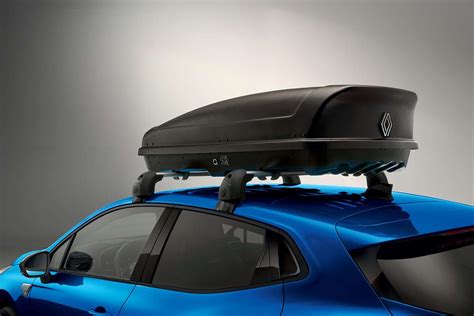 Schema van een Renault Clio met een gemonteerde dakkoffer, met pijlen die de maximale dakbelasting aangeven.
