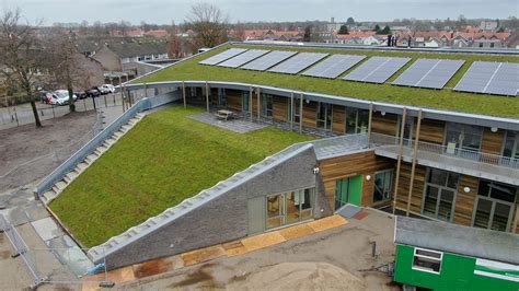 Foto van Sempergreen dak en houten gevels