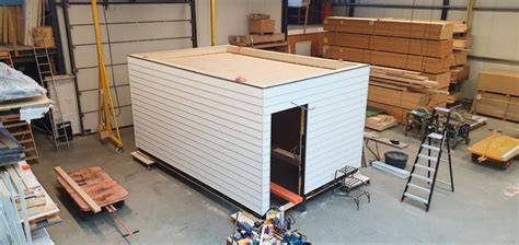 Diagram: prefab berging met betonvloer en coatings