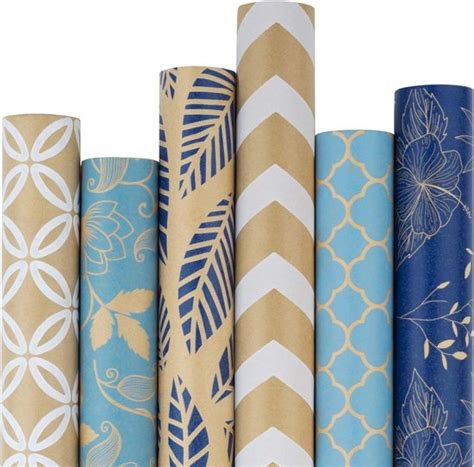 Overzicht van diverse Decomode vliesbehang rollen met verschillende patronen en kleuren