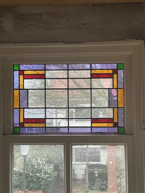 Voorbeeld van glas-in-lood bovenlicht en roeden