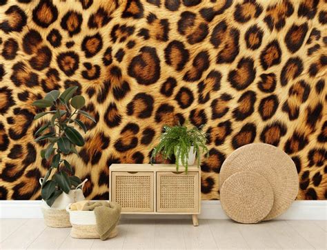 Illustratie van het ELITIS Panthère behang met panterprint in verschillende kleurstellingen