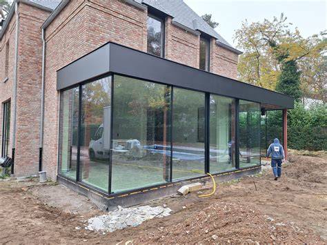 Risaleet woning - geveluitstulping en glaspartijen