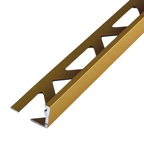 Goudkleurig aluminium tegelprofiel op wand