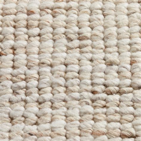 Decoratieve close-up van een wollen tapijt met textuur