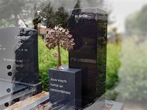 Bronzen grafmonument met boom en klok