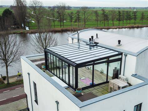Roosterafdekking voor dakafvoer op dakterras