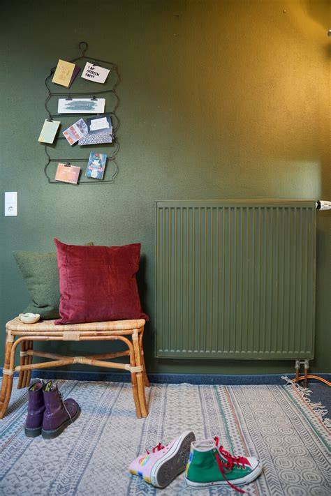 Voor-en-na foto: radiator in dezelfde tint als muur