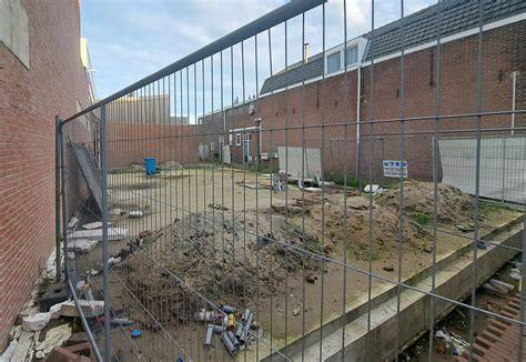 Foto van de bouwplaats Zijdstraat na brand