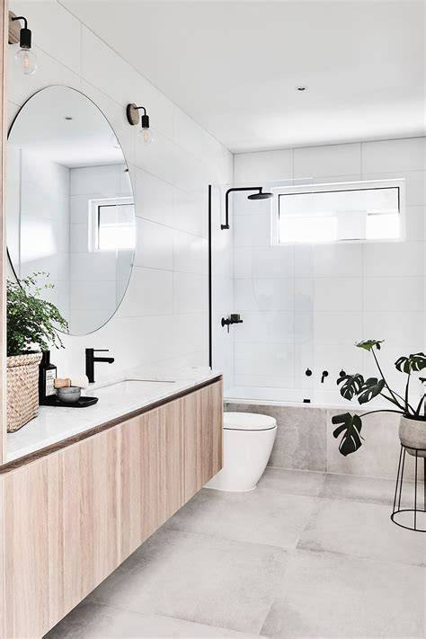 Scandinavische witte badkamer met houtaccenten infographic