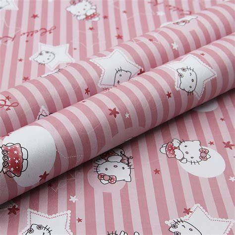 Afbeelding: Hello Kitty behang met vrolijke print voor de kinderkamer