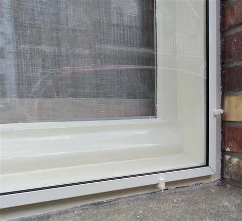 Foto: Voorzetramen en achterzetramen die kozijn brandwerend maken