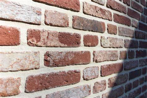 gevelsteen met kok en podiumlicht