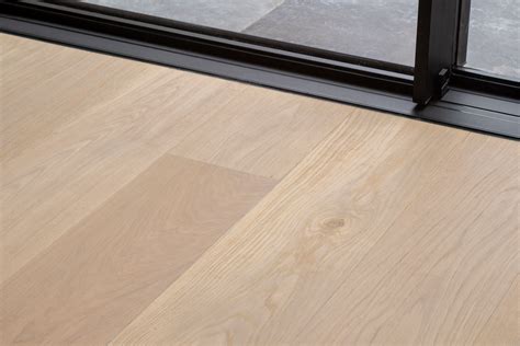 Infographic: overzicht van houtsoorten en legpatronen (eiken multiplank, visgraat, lamelparket, tapis)