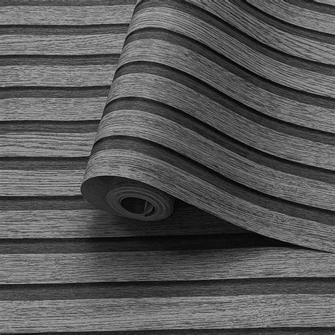 Overzicht van verschillende 3D-behangmaterialen: vlies, vinyl en zelfklevend