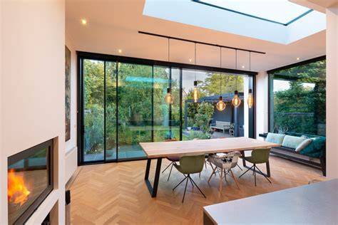 Drie maatwerk serres met luxe schuifpuien: modern, panoramisch en minimalistisch