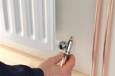 Foto: radiator montage en ontluchten stap voor stap