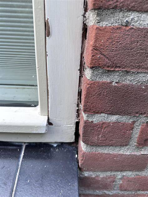 Diagram: Paal tussen muur en hoekjes gefixeerd